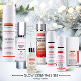 Glow Essentials Set with skincare products on a festive background