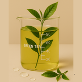 Beaker filled with green tea and green leaves on a beige background
