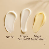 Swatches of SPF50 sunscreen, PM hyper serum, and night moisturizer on beige background