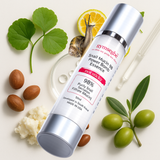 snail mucin extract surrounded by natural elements on a light background