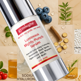 Gymsegbe Luminous Mighty Punch Serum with ingredients on a beige background