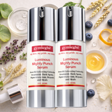 Two bottles of Gymsegge Luminous Mighty Punch Serum on a natural background with flowers and berries.