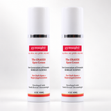 Two white cylindrical bottles of gymsegbé The Eraser Spot Cream with red and black text, shown side-by-side on a white background.