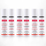 Six white cylindrical bottles of Gymmebe Spot Cream arranged in a row on a plain white background. Each bottle has a black cap, a red label band, and black text with red and blue details.