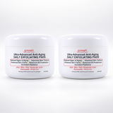 Two white plastic jars of gymsegbŋ Ultra-Advanced Anti-Aging Daily Exfoliating Pads, side by side on a clean white background.