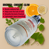 Skincare bottle with ingredients on a beige background