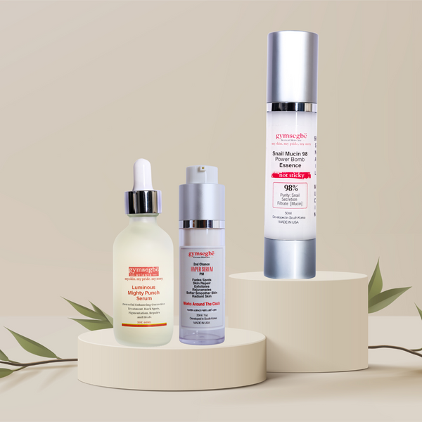 Three skincare products on a beige stand with a light background