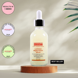 A bottle of Gymsegbe Luminous Mighty Punch Serum displayed against a background with floral elements, highlighting its skincare benefits. 60ml