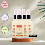 A bottle of Gymsegbe Luminous Mighty Punch Serum displayed against a background with floral elements, highlighting its skincare benefits.