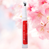 Eye cream with a red label against a soft floral background