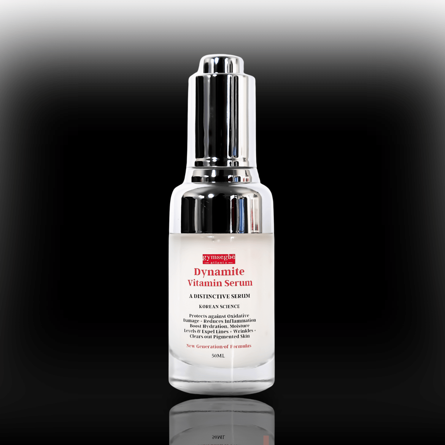 Skincare serum bottle labeled 'Dynamite Vitamin Serum' on a reflective black surface with a gradient background.